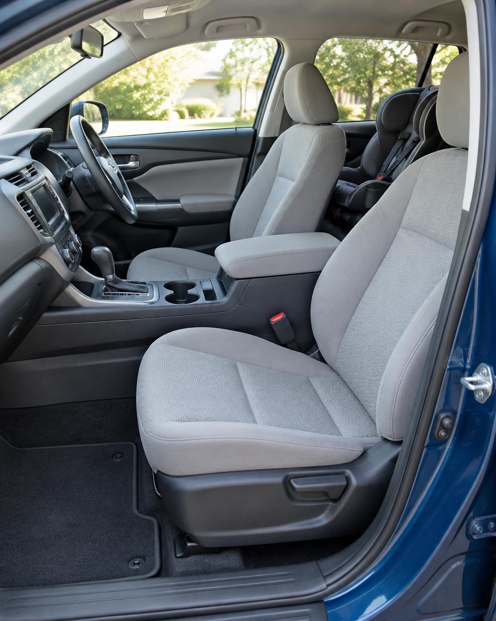 Freshly cleaned family car interior with a child seat in the back